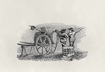 Dos hombres con un carro de barriles